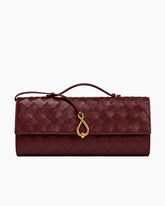 Woven Leather Top Handle Clutch with Sculptural Knot Closure