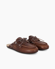 Pair of brown leather shoes on a white background