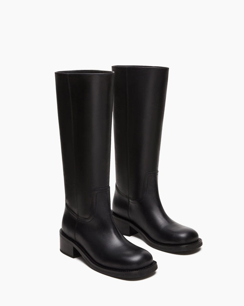 womens-airport-outfit-sophisticated-tall-square-toe-boots
