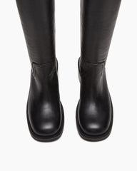womens-airport-outfit-sophisticated-tall-square-toe-boots