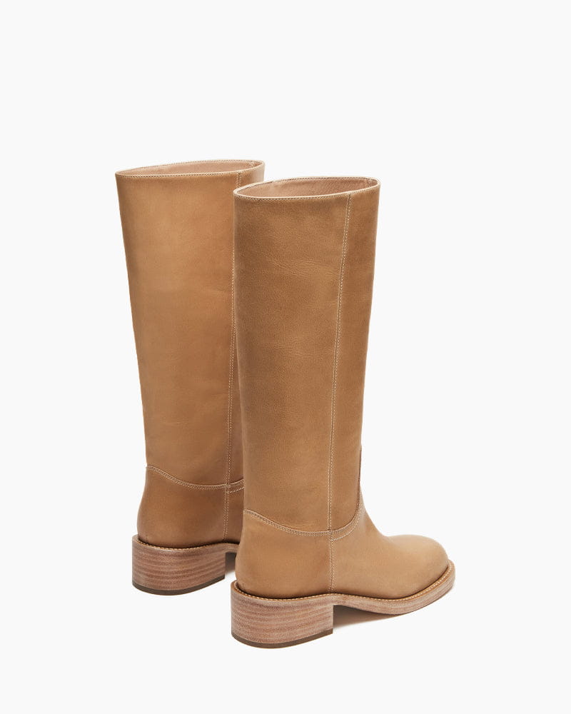 womens-airport-outfit-sophisticated-tall-square-toe-boots