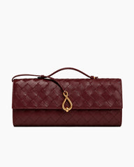 Woven Leather Top Handle Clutch with Sculptural Knot Closure